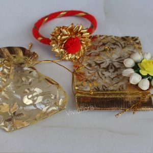 Gota Pompom Bangle with Potli