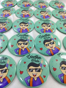 mint-green brooch with a smiling cartoon man in sunglasses and traditional attire. The text "Ladke Wale these brooches are perfect for baraat day, nikah ceremonies, and more