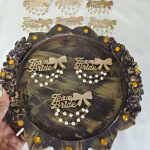 Team Bride badge adorned with pearls, suitable for bridal party gifts and wedding attire accessories. Perfect for Nikah ceremonies