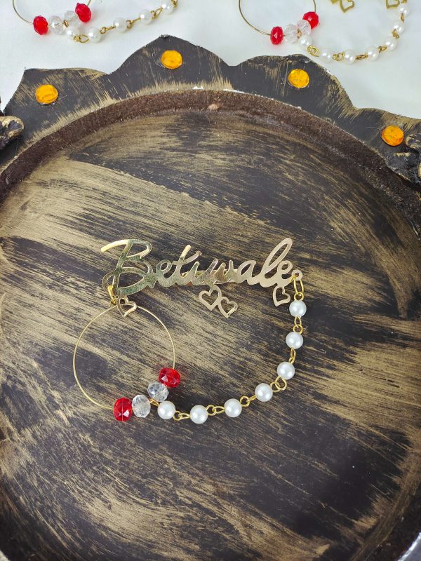 Beautiful Betiwale brooch featuring pearl and red bead accents, Ideal for wedding attire and lehenga embellishments