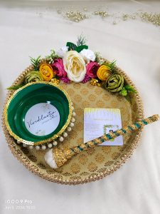Haldi ceremony platter in gold, adorned with pearls and yellow flowers Haldi, Mehndi, or Nikah ceremonies, offering a beautiful wedding favor that enhances the beauty and meaning of your special moments.