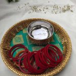 Elegant Mehndi platter in green with gold accents and an ornate brush, ideal for weddings, nikah ceremonies and other special occasions Ideal for brides looking to enhance their traditional wedding functions with sophistication and style