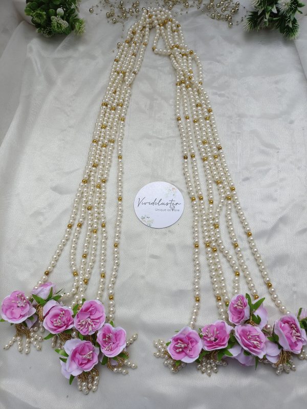 A set of intricate milni malas with pearls and pink roses, perfect for weddings, serving as guest malas, wedding favors, and decorative accessories for nikah ceremonies