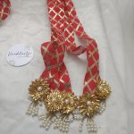 Red and gold Dupatta style Milni Mala with intricate pearl and flower decorations, perfect for nikah ceremony, wedding favor, and baaratis mala