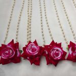 Crafted with red roses and pearl beads, this welcome milni mala is a perfect addition to any wedding ceremony. Suitable for nikah ceremonies, guest malas