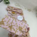 Vibrant Pink giveaway gift envelope featuring delicate pearl accents, ideal for baby showers bride and groom shagun envelope
