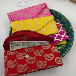 Modern and traditional printed envelopes with colorful designs, perfect for wedding cash gifts, shagun giveaways