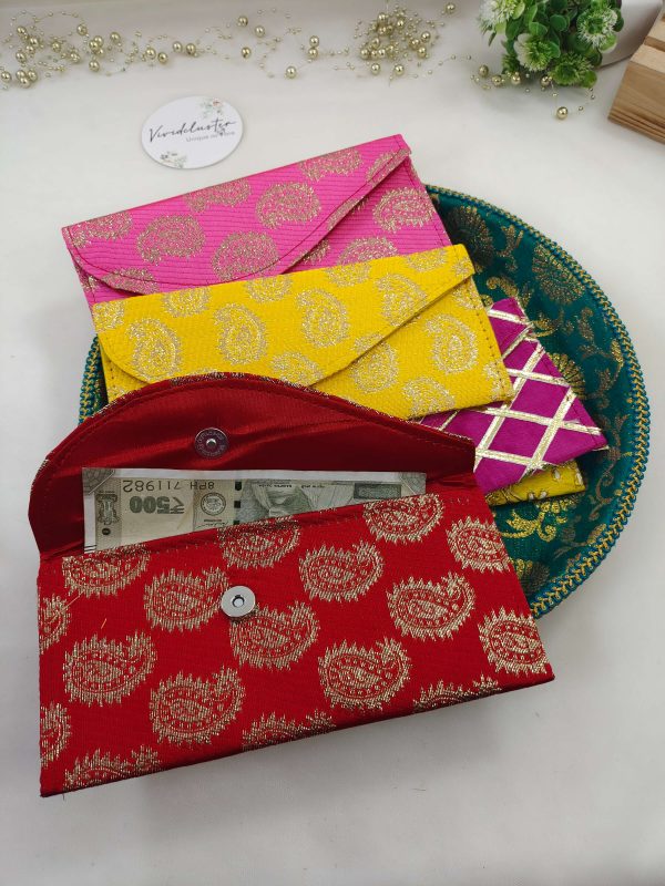Modern and traditional printed envelopes with colorful designs, perfect for wedding cash gifts, shagun giveaways