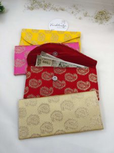 Beautifully printed envelopes featuring intricate designs and rich colors, perfect for nikah ceremonies, wedding favors