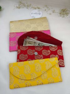 cash envelopes with traditional prints and vibrant colors, ideal for presenting monetary gifts during weddings, shagun ceremonies,