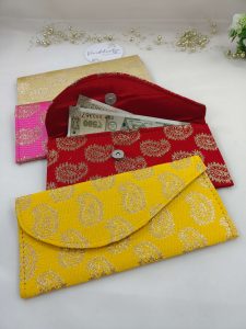 Colorful and traditional cash envelopes with intricate patterns, perfect for nikah ceremonies and wedding favors. Features rich hues and elegant designs to enhance your gifting experience