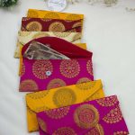 Handcrafted sahgun envelope set in striking colors, ideal for shagun giveaway gifts, wedding favors, bridal shower, and baby shower