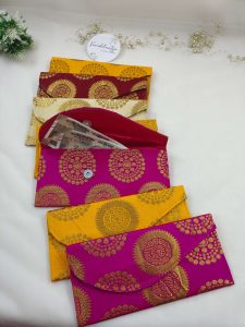 Handcrafted sahgun envelope set in striking colors, ideal for shagun giveaway gifts, wedding favors, bridal shower, and baby shower