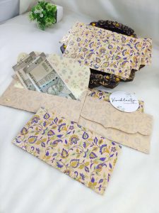 Colorful printed shagun envelopes adorned with intricate designs, perfect for shagun lifafa and wedding ceremonies