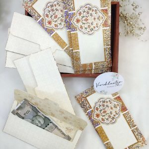 Set of vibrant printed shagun cash envelopes in various colors, perfect for presenting monetary gifts at weddings and special ceremonies