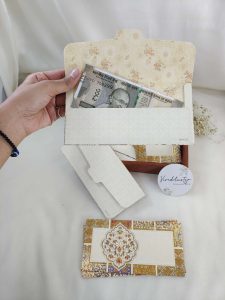 printed shagun cash envelopes with intricate gold detailing, suitable for shagun lifafa and wedding favors