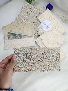 Beautifully designed printed shagun cash envelopes with intricate motifs, ideal for bridal showers and shagun giveaways