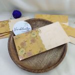 Elegant shagun lifafa with intricate gold designs, ideal for weddings and festive celebrations