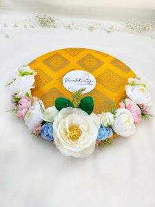 Charming floral Haldi platter with yellow accents, adding a festive touch to bridal showers and traditional wedding ceremonies wedding rituals