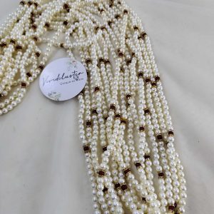 Intricate pearl garland featuring gold and maroon beads. Perfect for welcoming baaratis, this decorative flower milni mala
