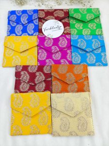Showcasing a variety of multicolored wedding money envelopes, this set includes traditional designs in green, pink, blue, orange, yellow,