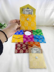 A set of traditional wedding shagun envelopes in vibrant colors for any ceremonial giveaways. Enhance your celebrations