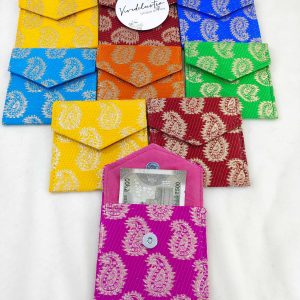 showcases a set of vibrant wedding shagun envelopes in various colors including green, pink, blue, orange, and yellow, each adorned with intricate traditional patterns. Perfect for nikah ceremonies, wedding favors, shagun giveaways