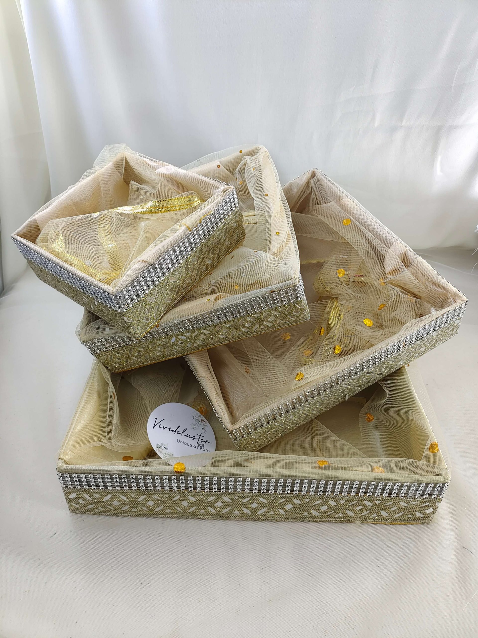Beautifully designed handcrafted shagun tray featuring premium MDF and delicate net, suitable for Haldi Sangeet and wedding return gifts. Use this versatile tray for engagement, mehendi, and other special events