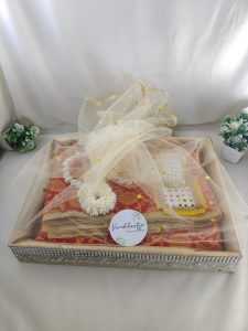 High-quality MDF and net shagun tray, handcrafted for sangeet and engagement return gifts. This elegant tray is perfect for guest giveaways,