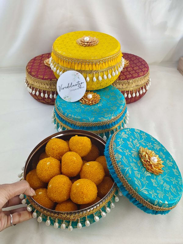 brocade boxes with pearl and gold embellishments for bridesmaids and guest gifts Their beautiful design makes them a keepsake that guests will cherish