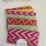 handcrafted shagun lifafa in rich pink and orange, featuring intricate gota, perfect for shagun ceremony giveaways and bridal shower favors