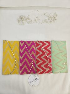 colorful envelope adorned with gota silk and pearl embellishments, perfect for shagun gifts.