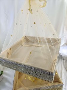 Exquisite handcrafted shagun tray designed for sangeet and engagement ceremonies. Made from durable MDF and net, this marriage tray is ideal for return gift