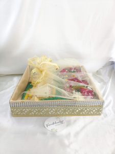 MDF shagun tray with net detailing, perfect for sangeet, engagement, and return gifts. Use this tray for guest giveaways