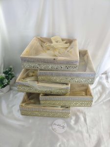 Beautiful handcrafted shagun tray made from high-quality MDF and adorned with net. Ideal for sangeet, engagement, and return gifts, this tray enhances guest giveaways and baby showers with its elegant design