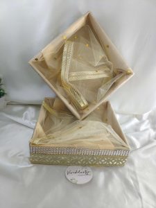 Beautiful handcrafted shagun tray made from high-quality MDF and adorned with net. Ideal for sangeet, engagement, and return gifts, this tray enhances guest giveaways