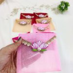 Assorted colorful lotus net shagun envelopes featuring golden lace and a lotus embellishment, suitable for shagun lifafa and baby showers