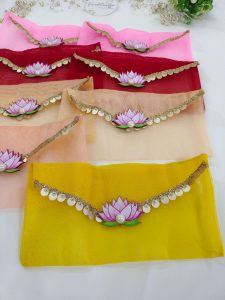 lotus net shagun envelopes in vibrant colors with intricate golden lace and sequin details, perfect for nikah ceremony envelopes and wedding favors.
