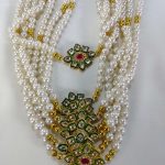 Handcrafted bridal necklace featuring white pearls, golden beads, and a detailed floral pendant, ideal for bridesmaid gifts and wedding favors, Use this beautiful mala on your brothers or cousins wedding ceremony and look gorgeous.