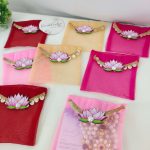 Colorful lotus net shagun envelopes adorned with gold lace and lotus flower, perfect for shagun lifafa and wedding ceremony giveaways.