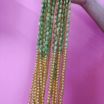 green beaded mala necklace with golden accents, perfect for traditional bridal jewelry at weddings. wedding gift for your bridesmaid for ceremonies