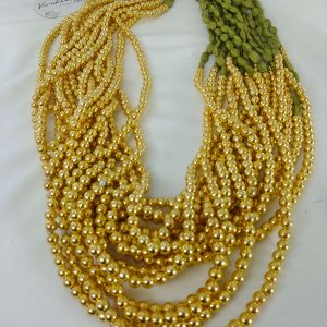 A pair of Welcome Elachi Design Milni mala with green beads and golden pearls or Nikah ceremonies and wedding favors