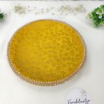 Decorative yellow Haldi ceremony platter with pearl-trimmed bowls and floral accents to add a touch to your wedding rituals haldi mehndi ceremony platter
