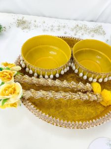 Beautiful Haldi ceremony platter with decorative yellow bowls, adorned with pearl trim and floral charm made it for the Haldi ritual Haldi Ceremony Platter Crafted with attention to detail
