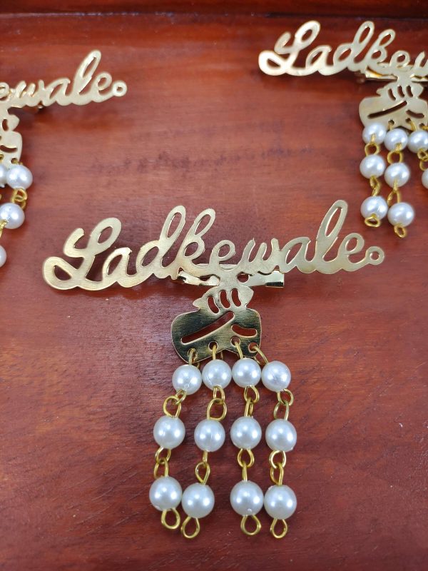 pearl-adorned Ladkewale Gold Plated Brooches. The brooch features a delicate arrangement of pearls on a classic design, ideal for baaratis and groom side badges