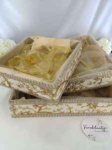 Handcrafted Golden Embroidery Tray with lace detailing, perfect for weddings and celebrations. This elegant tray, adorned with intricate lace accents, is ideal for nikah ceremonies, wedding favors, return gifts, and baby showers. this shagun tray is a memorable keepsake