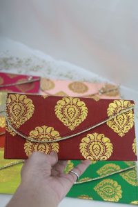 Set of printed shagun envelopes featuring elegant patterns, ideal for wedding favors and shagun giveaways.