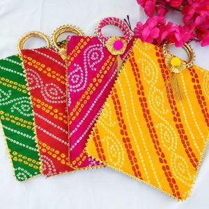 colorful selection of Bandhani Print Themed Potlis, featuring traditional designs, ideal for wedding favor bags, nikah ceremony gifts, and wedding giveaways