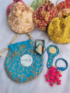 collection of beautifully embroidered potli bags, perfect for weddings and Nikah ceremonies. These bags, adorned with intricate gold threadwork, come in vibrant colors like green, yellow, pink, and beige. Ideal as wedding favors, bride's wedding favors, bridesmaid gifts, and wedding accessories
