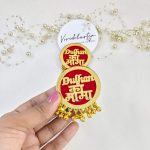Collection of vibrant "Dulhan ke Mama" brooches featuring green, maroon, and orange designs with intricate golden details for wedding attire accessories